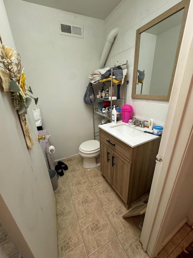 570 Scuffling Hill Rd, Rocky Mount, VA 24151 - bathroom featuring toilet, vanity, and tile patterned floors