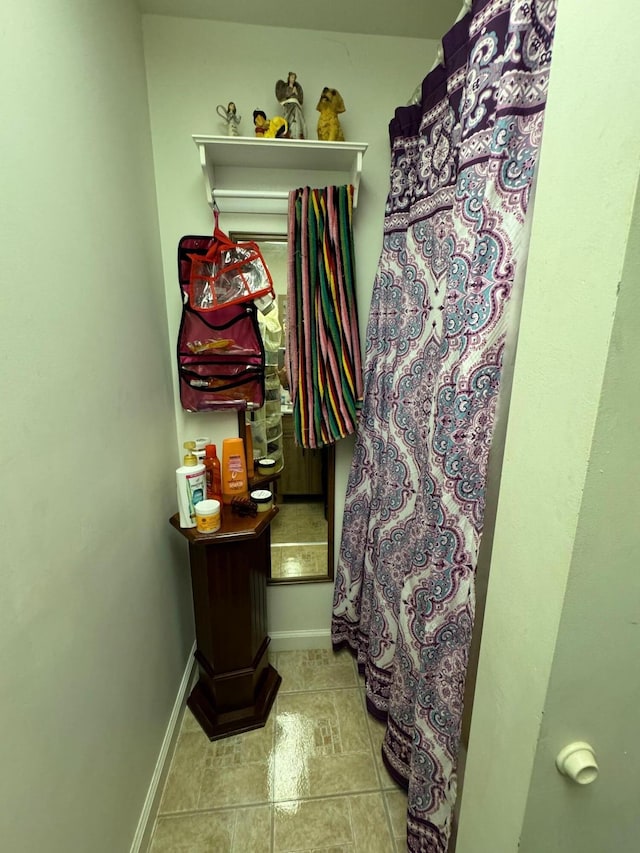 570 Scuffling Hill Rd, Rocky Mount, VA 24151 - bathroom featuring a shower with shower curtain and baseboards