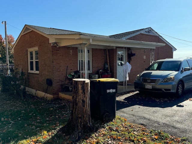 570 Scuffling Hill Rd, Rocky Mount, VA 24151 - view of home's exterior featuring brick siding and a shingled roof