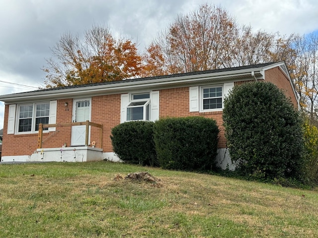570 Scuffling Hill Rd, Rocky Mount, VA 24151 - ranch-style home with brick siding and a front lawn