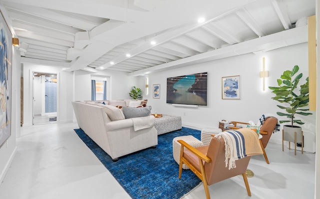 2561 Inglewood Rd SW, Roanoke, VA 24015 - living room with beam ceiling, baseboards, and finished concrete floors