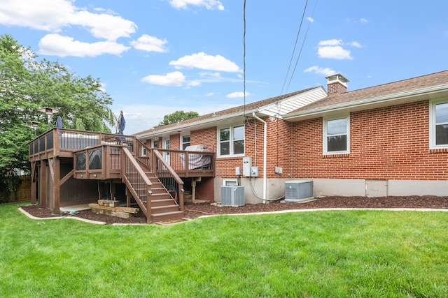 2561 Inglewood Rd SW, Roanoke, VA 24015 - back of house featuring brick siding, stairway, central AC, a chimney, and a deck
