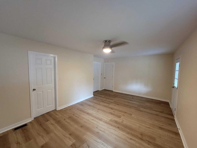 640 Cooks Knob Rd, Ferrum, VA 24088 - empty room with a ceiling fan, light wood-style flooring, and baseboards