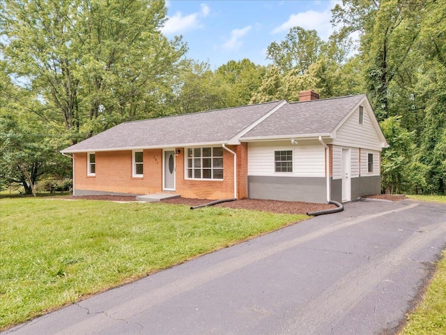 201 Forest Ridge Dr, Vinton, VA 24179 - ranch-style house featuring brick siding, a chimney, a shingled roof, and a front lawn