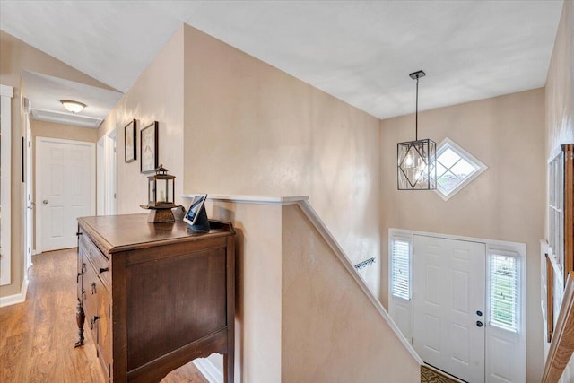 590 Keystone Dr NW, Christiansburg, VA 24073 - foyer featuring light wood finished floors and a chandelier