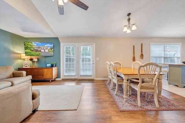 590 Keystone Dr NW, Christiansburg, VA 24073 - dining room featuring plenty of natural light, wood finished floors, a ceiling fan, baseboards, and vaulted ceiling