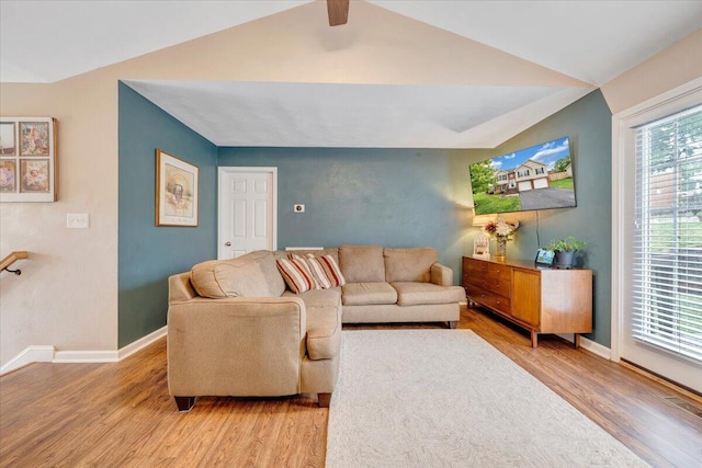 590 Keystone Dr NW, Christiansburg, VA 24073 - living area with wood finished floors, vaulted ceiling, and baseboards
