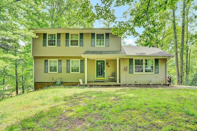 508 Hemlock Shores Dr, Goodview, VA 24095 - view of front of property with covered porch and a front yard