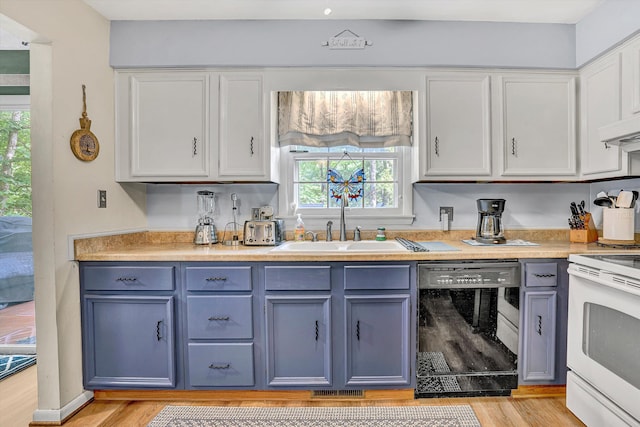 508 Hemlock Shores Dr, Goodview, VA 24095 - kitchen featuring dishwasher, white range with electric cooktop, light wood-type flooring, white cabinets, and light countertops