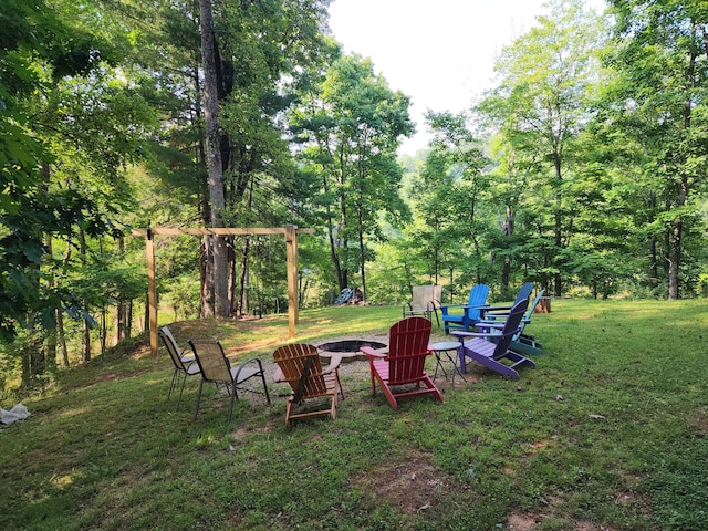 508 Hemlock Shores Dr, Goodview, VA 24095 - view of green lawn featuring a fire pit