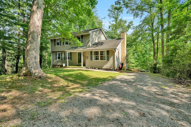 508 Hemlock Shores Dr, Goodview, VA 24095 - view of front of home featuring a chimney