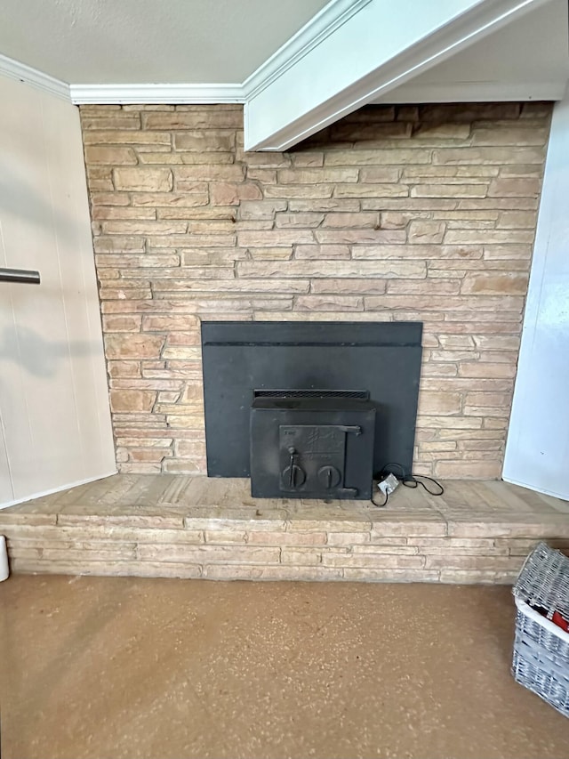 104 Wintergreen Ave, Clifton Forge, VA 24422 - detailed view of a fireplace with raised hearth and crown molding