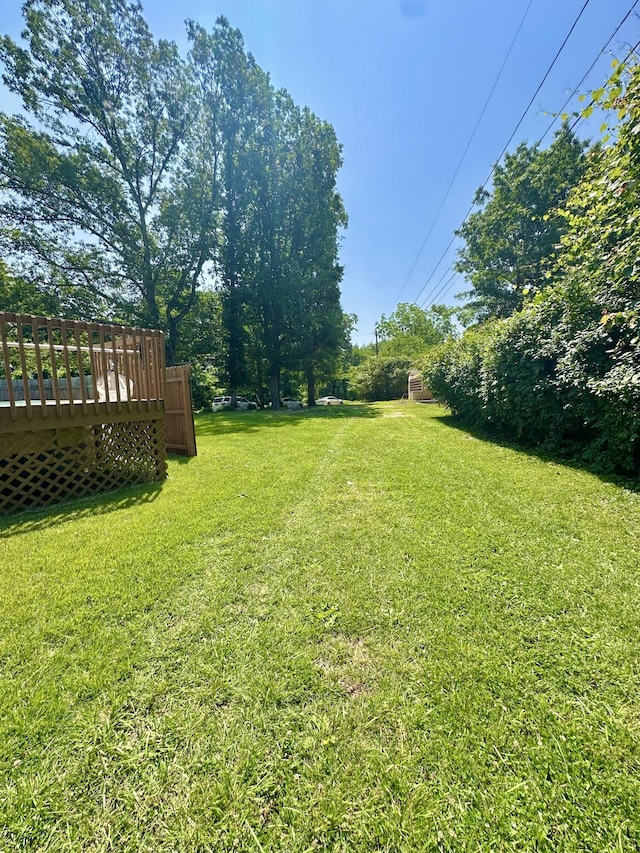 104 Wintergreen Ave, Clifton Forge, VA 24422 - view of grassy yard with a deck