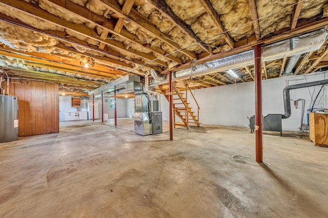 20083 Snow Creek Rd, Penhook, VA 24137 - unfinished basement with heating unit, electric water heater, and stairway