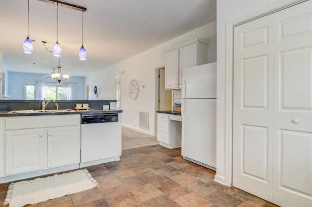 1103 Mariners Way Unit 5, Huddleston, VA 24104 - kitchen featuring white appliances, a sink, dark countertops, pendant lighting, and stone finish floors
