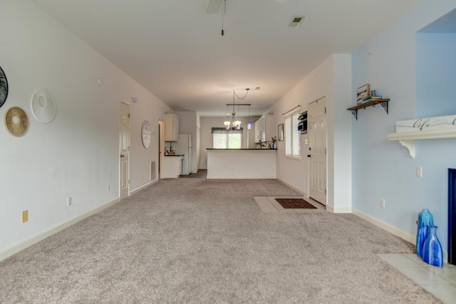 1103 Mariners Way Unit 5, Huddleston, VA 24104 - unfurnished living room featuring carpet, a chandelier, and baseboards