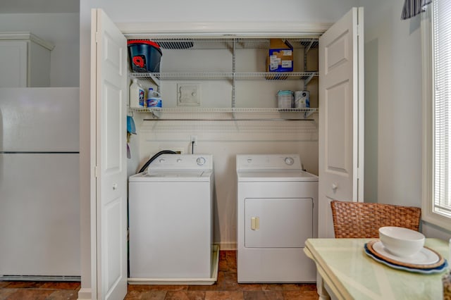 1103 Mariners Way Unit 5, Huddleston, VA 24104 - laundry area with independent washer and dryer and stone finish flooring