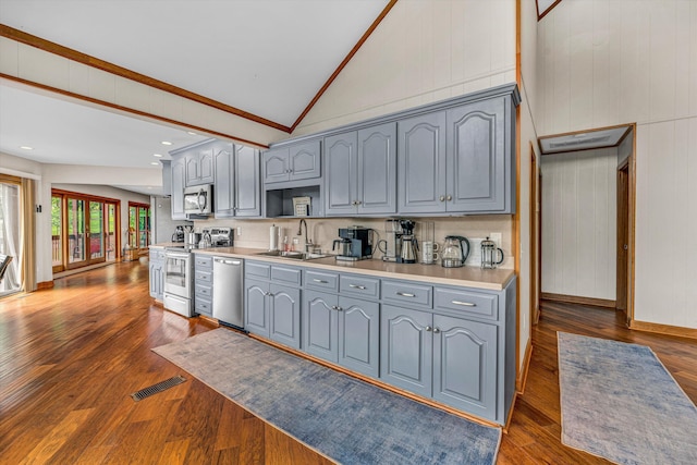 510 Crestview Rd, Wirtz, VA 24184 - kitchen with appliances with stainless steel finishes, gray cabinetry, a sink, light countertops, and high vaulted ceiling