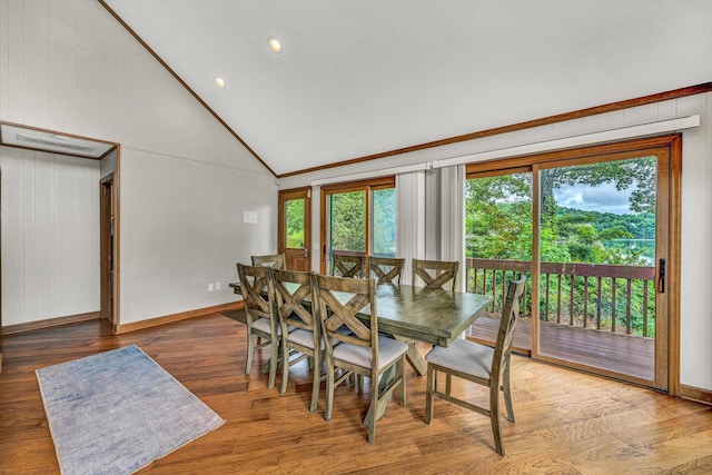 510 Crestview Rd, Wirtz, VA 24184 - dining area with healthy amount of natural light, baseboards, wood finished floors, crown molding, and high vaulted ceiling
