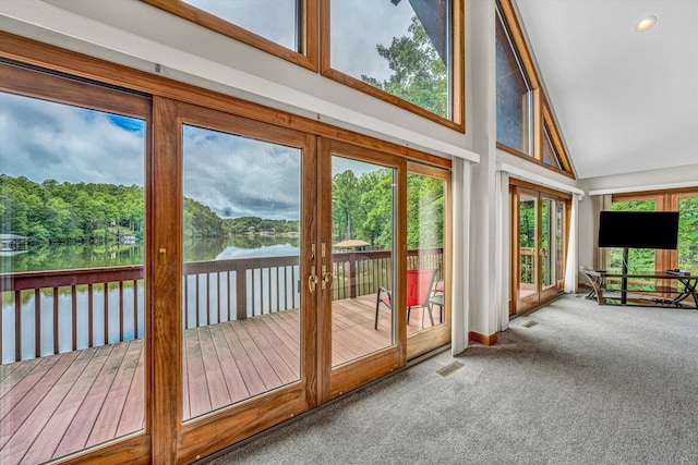 510 Crestview Rd, Wirtz, VA 24184 - unfurnished sunroom with carpet, a deck, high vaulted ceiling, and french doors