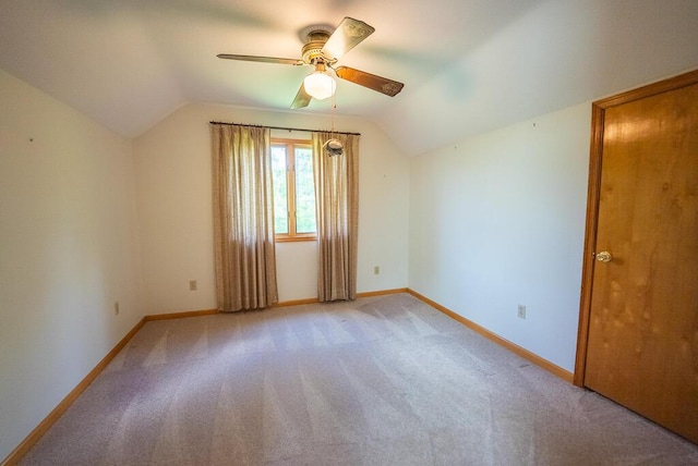 1978 Laurel Creek Rd NE, Pilot, VA 24138 - spare room with a ceiling fan, vaulted ceiling, light carpet, and baseboards