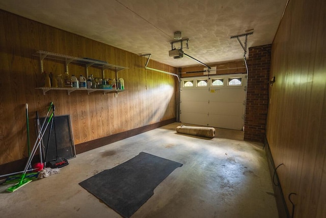 1978 Laurel Creek Rd NE, Pilot, VA 24138 - garage featuring wooden walls and a garage door opener