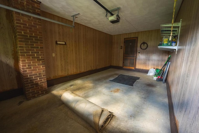 1978 Laurel Creek Rd NE, Pilot, VA 24138 - garage featuring a garage door opener and wood walls