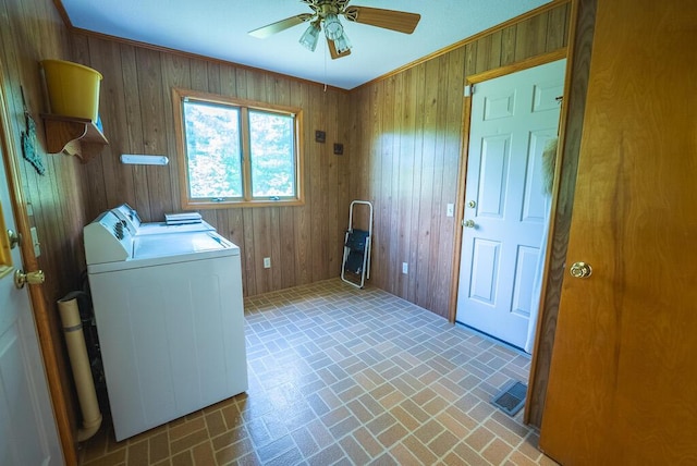 1978 Laurel Creek Rd NE, Pilot, VA 24138 - washroom featuring washing machine and dryer, brick patterned flooring, a ceiling fan, and wood walls