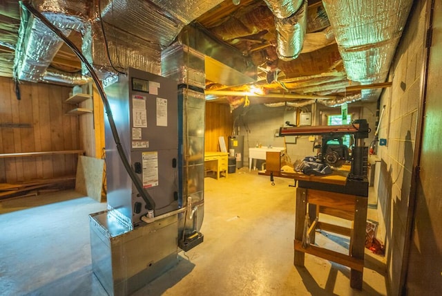 1978 Laurel Creek Rd NE, Pilot, VA 24138 - unfinished basement featuring water heater, wood walls, and heating unit