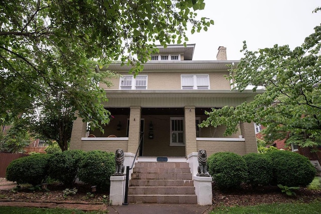 1810 Windsor Ave SW, Roanoke, VA 24015 - traditional style home featuring brick siding, covered porch, and a chimney
