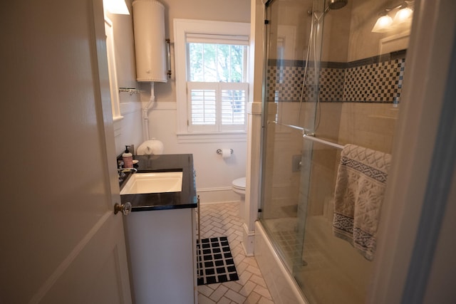 1810 Windsor Ave SW, Roanoke, VA 24015 - full bathroom with water heater, vanity, tiled shower, and toilet