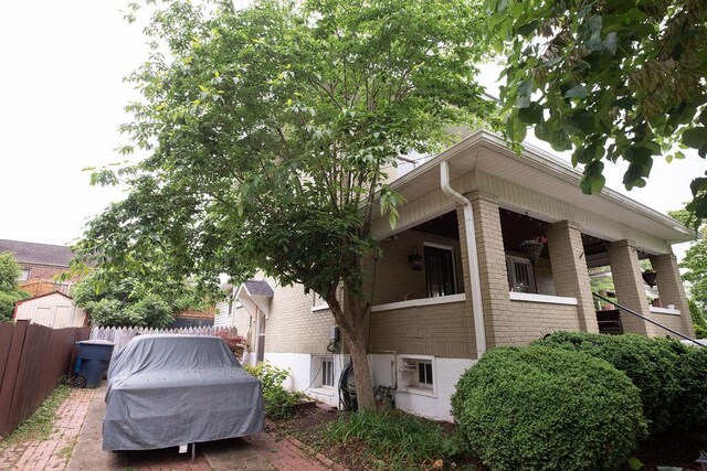 1810 Windsor Ave SW, Roanoke, VA 24015 - view of side of home with brick siding