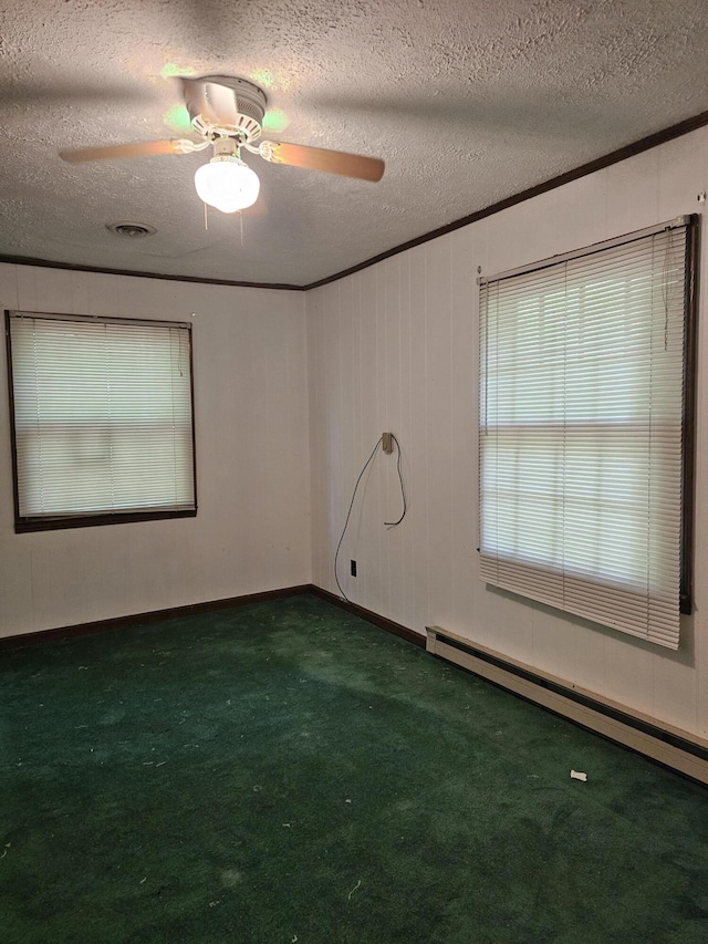 145 Carlos Rd, Union Hall, VA 24176 - empty room featuring a baseboard radiator, a textured ceiling, carpet, crown molding, and ceiling fan