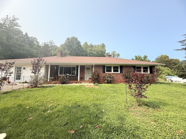 3135 Doe Run Rd, Rocky Mount, VA 24151 - ranch-style house with a front lawn, a porch, a chimney, and brick siding