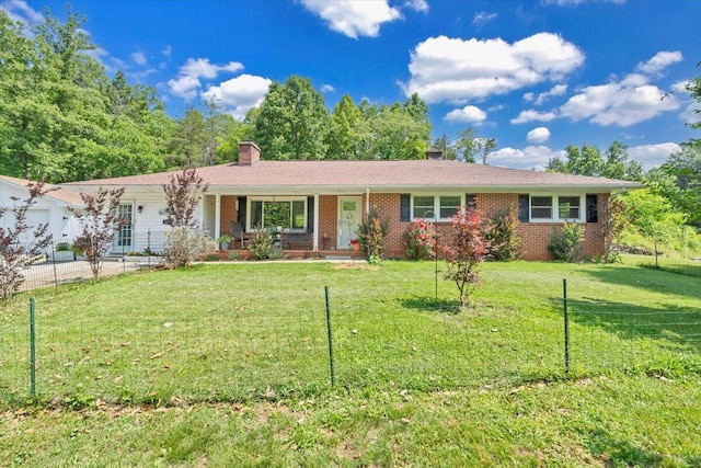 3135 Doe Run Rd, Rocky Mount, VA 24151 - single story home featuring a chimney, covered porch, brick siding, and a garage