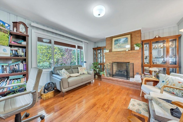 3135 Doe Run Rd, Rocky Mount, VA 24151 - living room featuring ornamental molding, wood finished floors, and a fireplace
