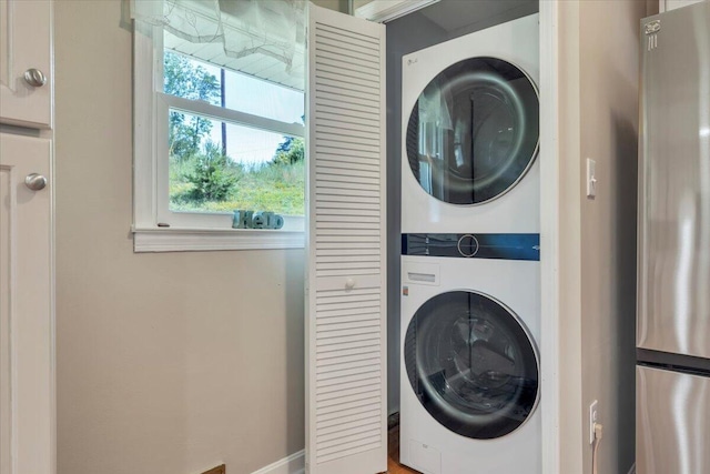 3135 Doe Run Rd, Rocky Mount, VA 24151 - laundry room featuring stacked washer / dryer