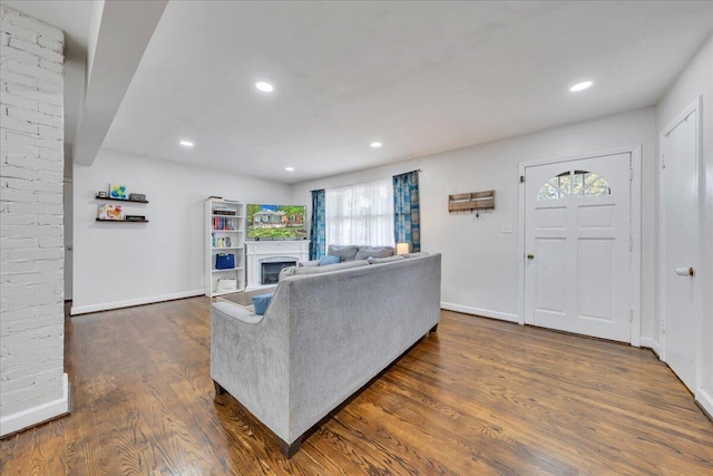 4708 Pawling St NW, Roanoke, VA 24012 - living room with plenty of natural light, dark wood-style floors, a fireplace, baseboards, and recessed lighting