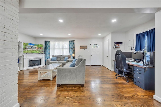 4708 Pawling St NW, Roanoke, VA 24012 - living area featuring a fireplace with raised hearth, dark wood-style flooring, recessed lighting, and an office area