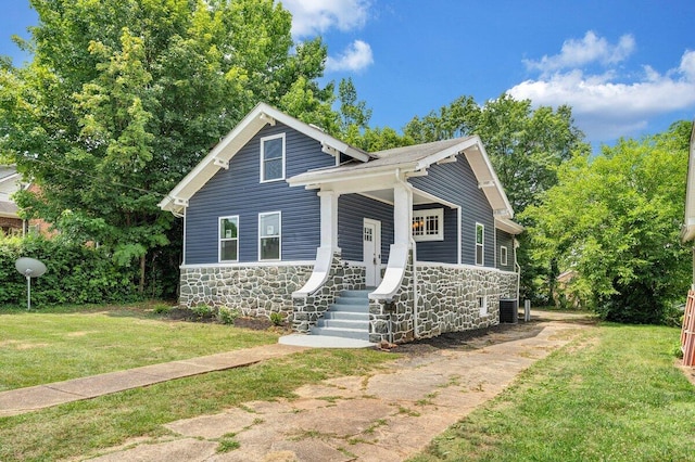 3311 Memorial Ave, Lynchburg, VA 24501 - bungalow-style home with stone siding and a front lawn