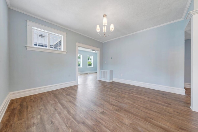 3311 Memorial Ave, Lynchburg, VA 24501 - unfurnished living room with a chandelier, wood finished floors, and crown molding