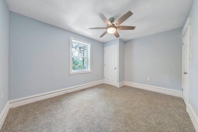 3311 Memorial Ave, Lynchburg, VA 24501 - carpeted spare room with a textured ceiling and a ceiling fan