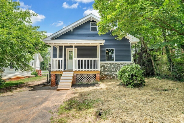 3311 Memorial Ave, Lynchburg, VA 24501 - view of front of house with covered porch, stone siding, and stairway