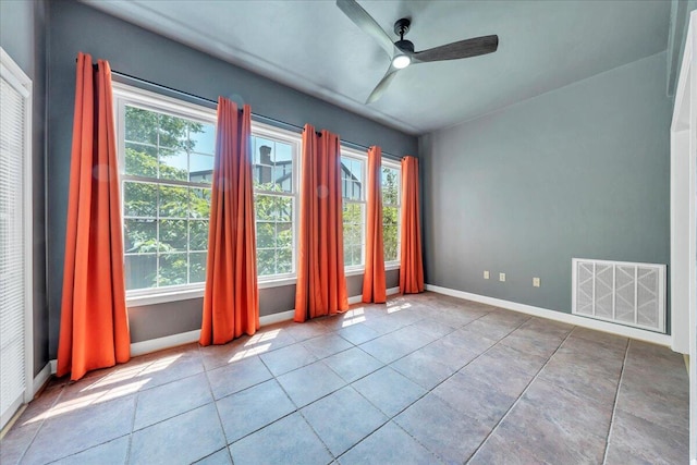 2208 Jefferson St SE Unit 104, Roanoke, VA 24014 - tiled empty room featuring a ceiling fan and baseboards