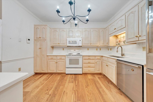 2208 Jefferson St SE Unit 104, Roanoke, VA 24014 - kitchen with white appliances, a sink, light wood finished floors, a chandelier, and ornamental molding