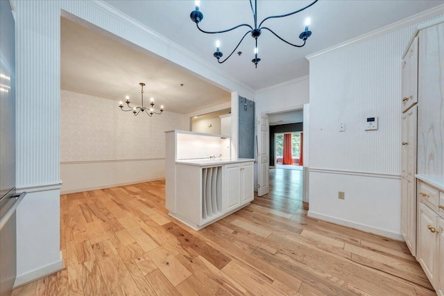 2208 Jefferson St SE Unit 104, Roanoke, VA 24014 - kitchen featuring a chandelier, ornamental molding, light wood-style flooring, and white cabinets
