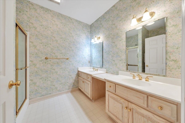 2208 Jefferson St SE Unit 104, Roanoke, VA 24014 - bathroom with a shower stall, vanity, tile patterned floors, wallpapered walls, and baseboards