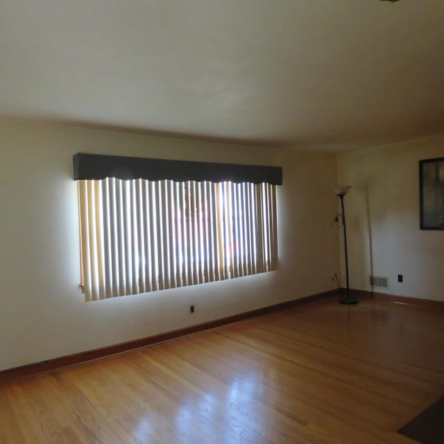 383 Main St, New Castle, VA 24127 - spare room featuring wood finished floors and baseboards
