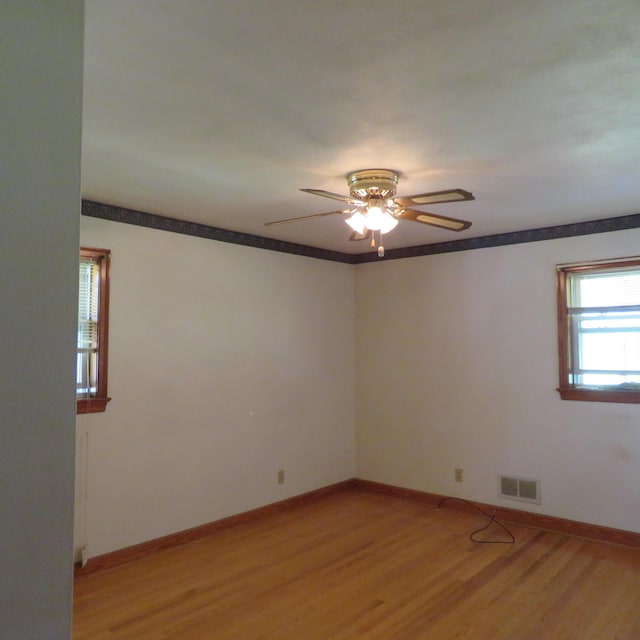 383 Main St, New Castle, VA 24127 - empty room with ceiling fan, light wood-type flooring, and baseboards