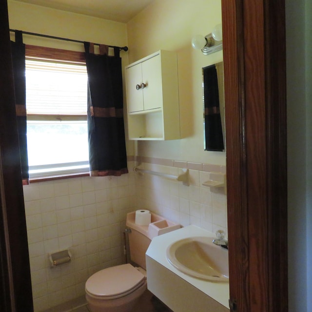 383 Main St, New Castle, VA 24127 - bathroom featuring toilet, tile walls, and vanity